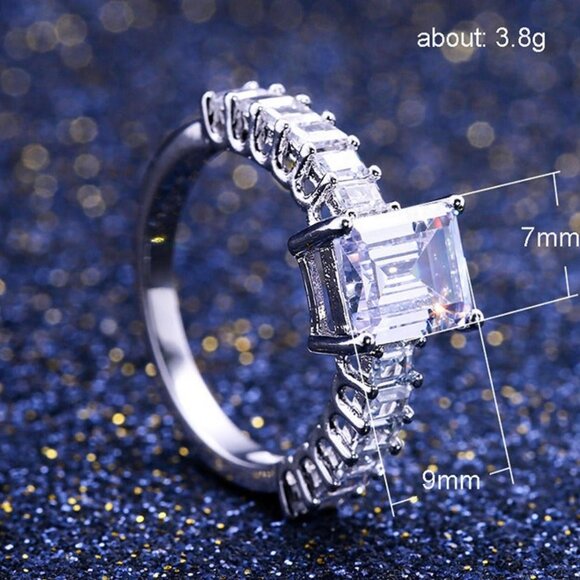 Women's Zirconia Ring with an Emerald Cut Featuring Baguette Side Accents - Picture 3 of 5